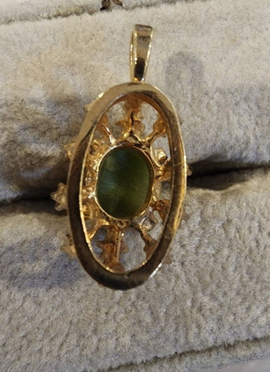 Elegant Pendent with Green Tigers eye gemstone accented with sparking clear stone